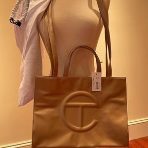 telefar gold bag NWT